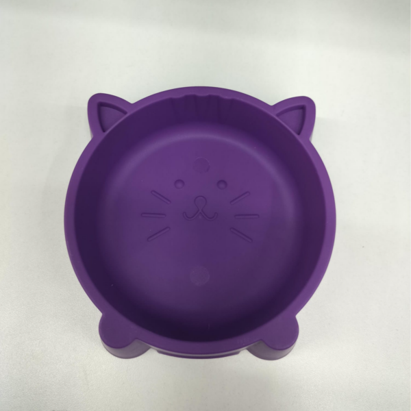 Cat food and water bowl - durable and easy to clean - with a fun cat face design, purple color, suitable for pets - وعاء طعام وشراب للقطط - متينة وسهلة التنظيف - بتصميم وجه قطة مرحة لون بنفسجي مناسبة للحيوانات الاليفة